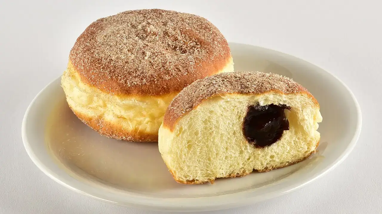 Filled doughnuts on a plate